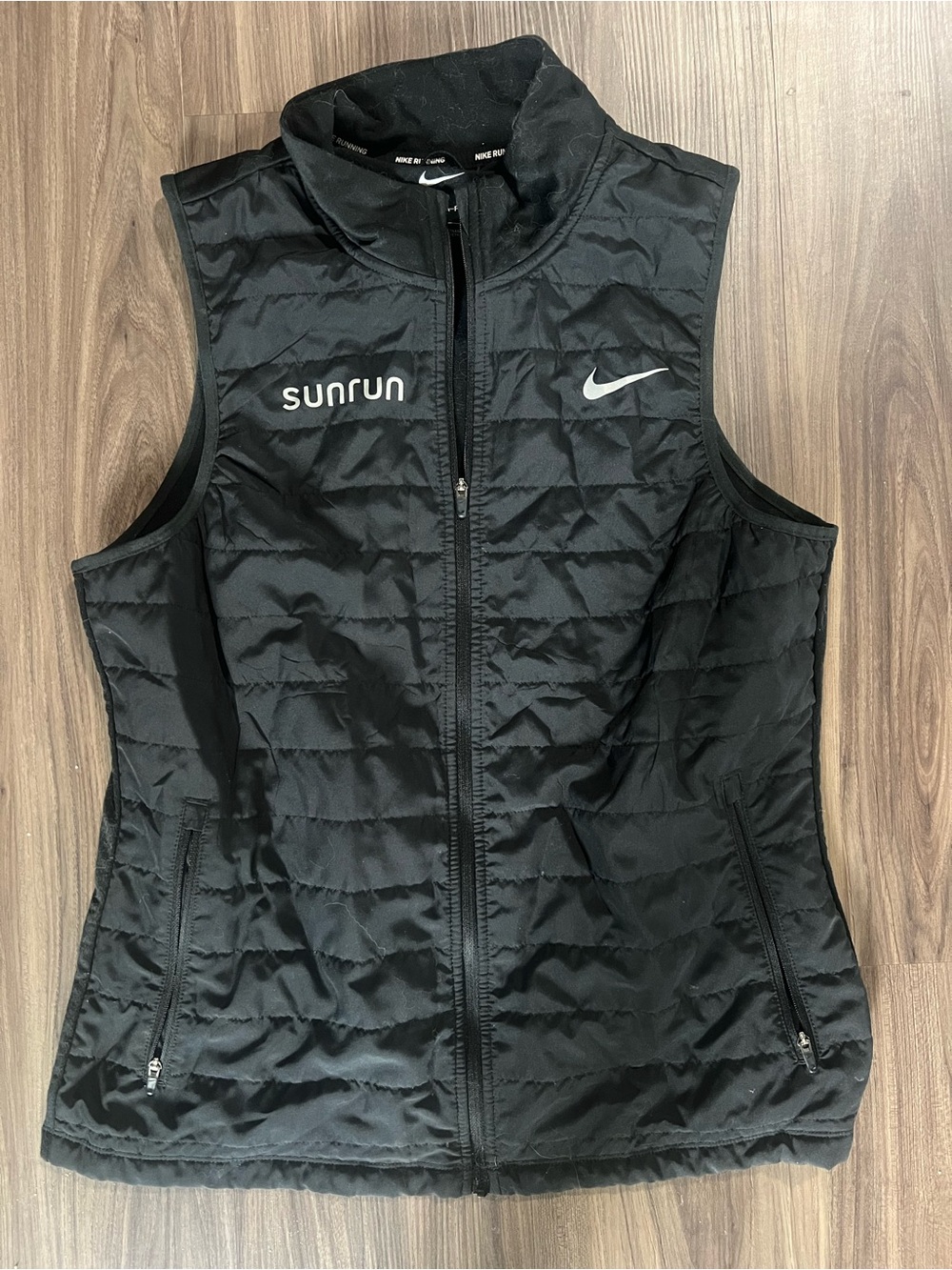 Nike Women's Black Quilted Vest with Sunrun and Swoosh Logos